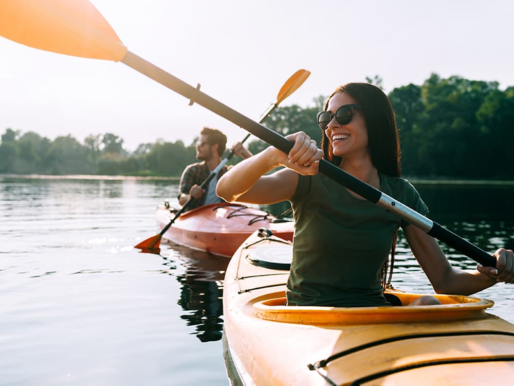 People enjoying recreation on the lake